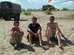 Slava, Andrey and Henning relax beside the Lena River